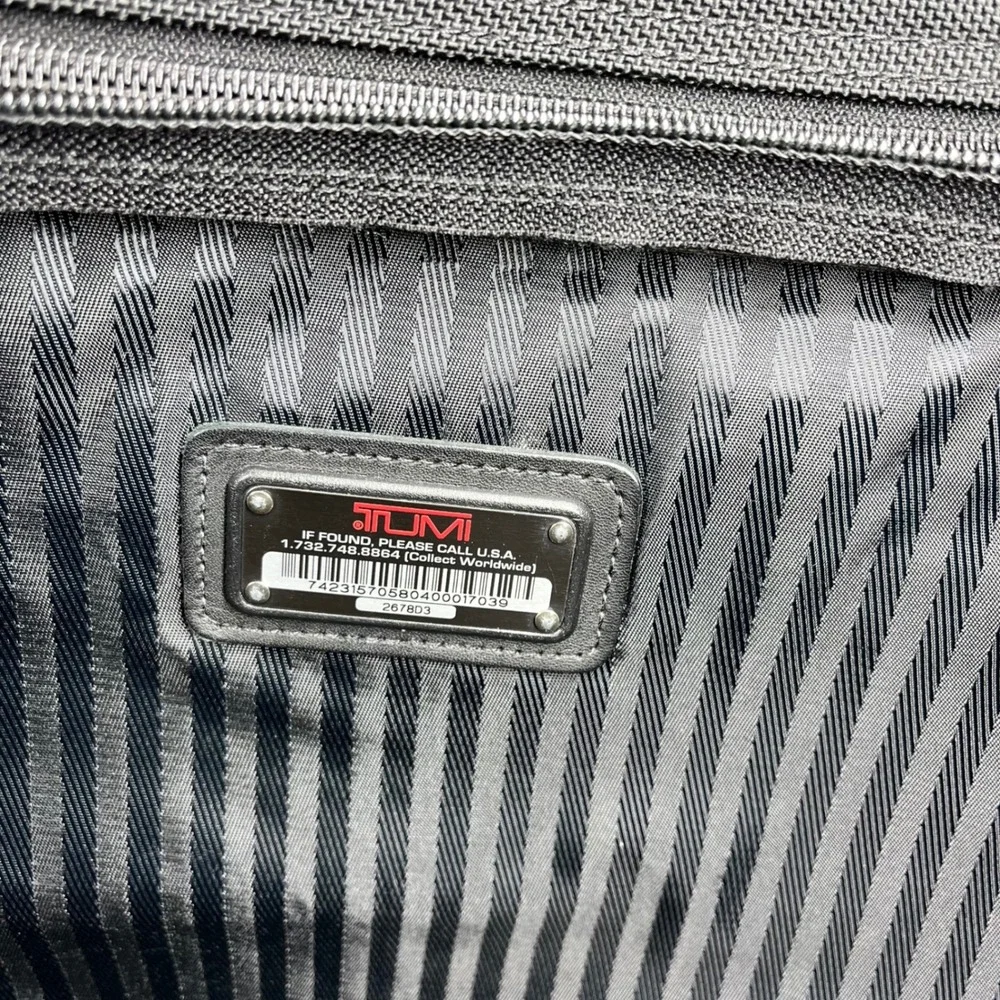 Tumi secure slide